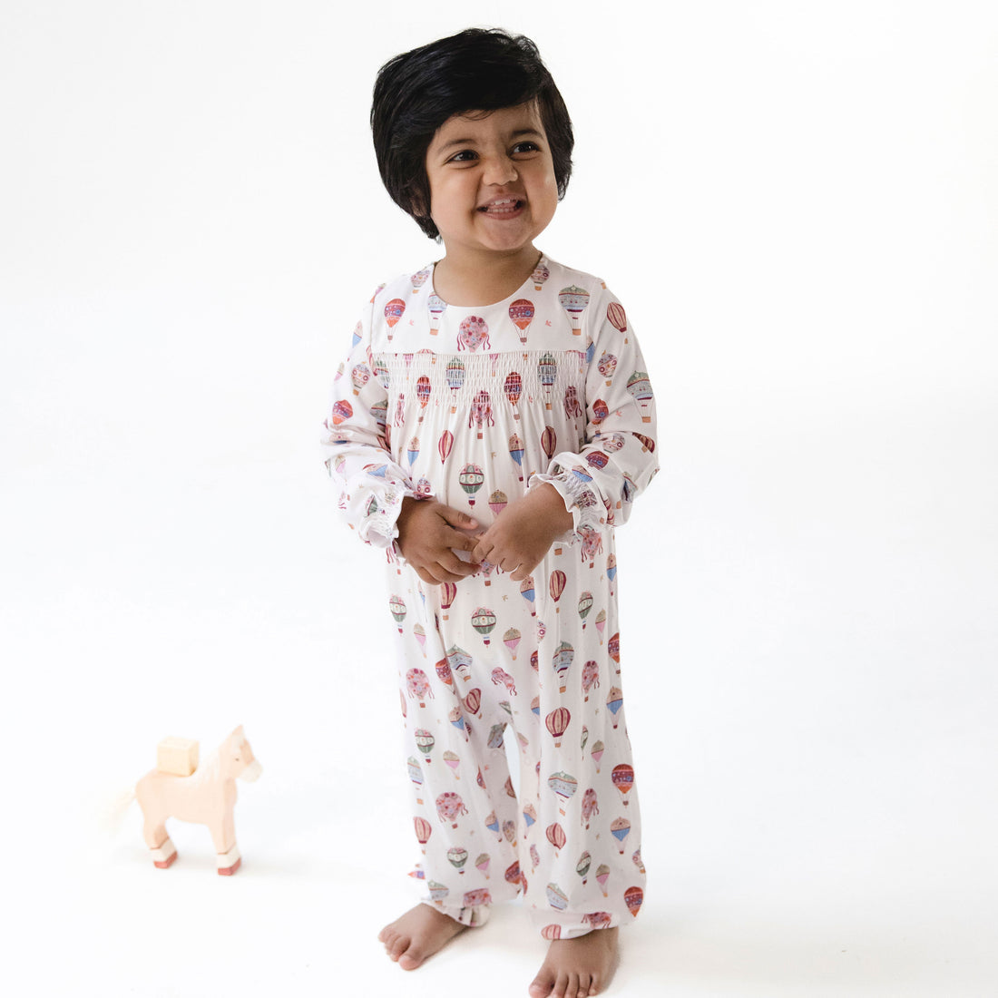Smocked Long Sleeve Romper