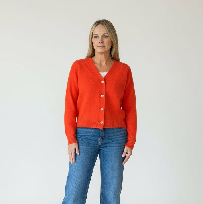 Orange cashmere Kerri Rosenthal cardigan, color tomato, Whisper Featherweight Cardigan, “on and on forever”